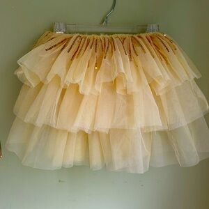 Disney pale yellow tulle skirt with gold sequins. 3 tier. No flaws 5/6